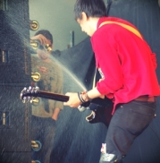 Ivan destroying the guitar at Leeds Festival